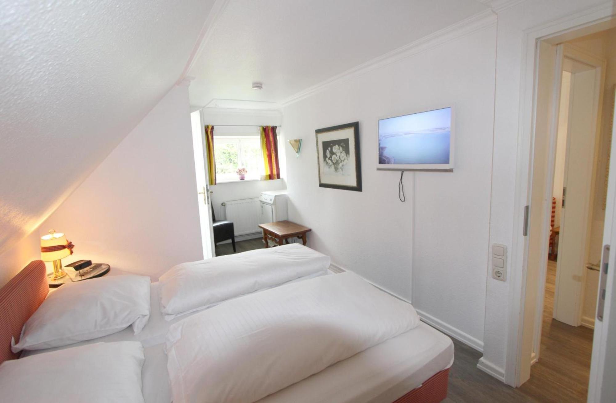 Residenz Nikolas- Grenzweg 12, App 2 Ferienhaus Wenningstedt-Braderup