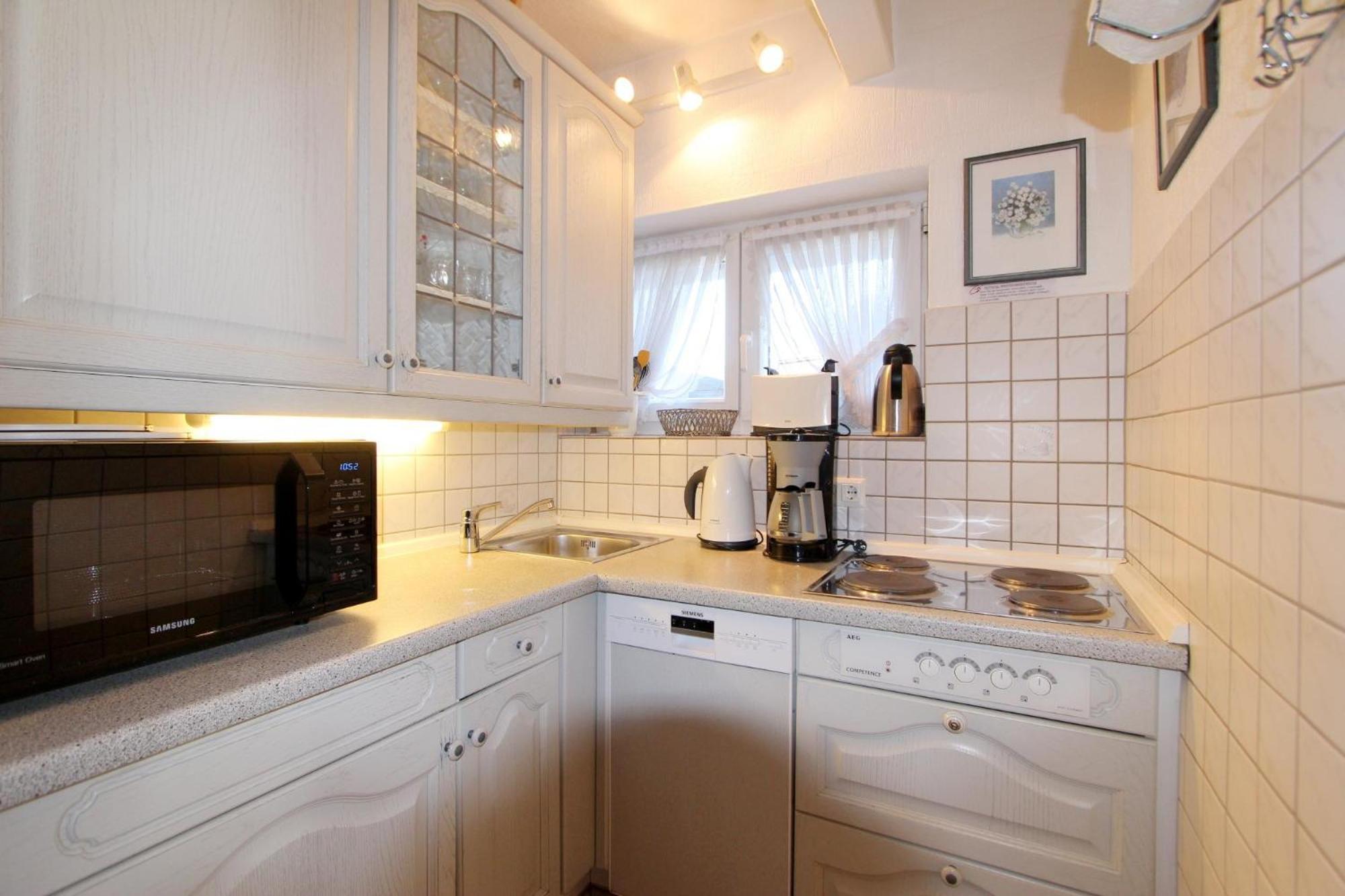Residenz Nikolas- Grenzweg 12, App 2 Ferienhaus Wenningstedt-Braderup